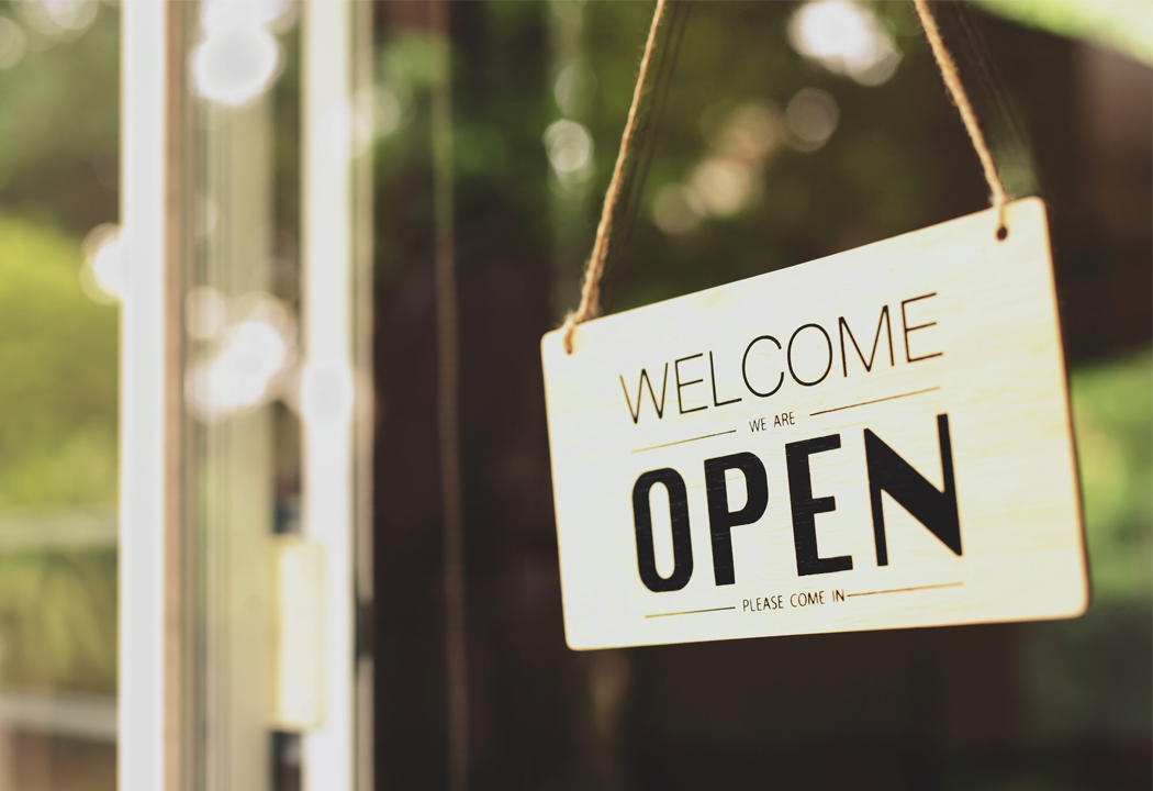 Photo of an 'open for business' sign. Primary Bank is NH's Bank for Business!